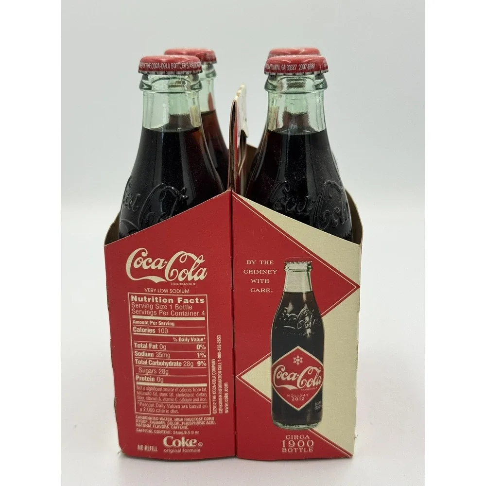 4 Pack of 2012 Coca-Cola Coke Christmas Santa Claus Holiday Full Bottles
